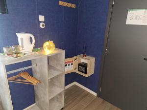 Kaffee-/Teezubehör in der Unterkunft Waregem Hotel A