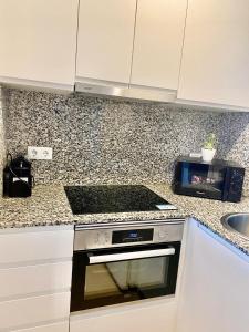 Kuchyňa alebo kuchynka v ubytovaní Apartamento Marinada