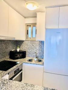 Kuchyňa alebo kuchynka v ubytovaní Apartamento Marinada