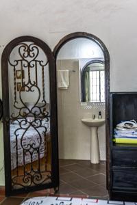 Postel nebo postele na pokoji v ubytování Casa Rivera Del Castillo