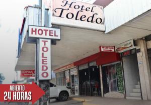 Certifikat, nagrada, logo ili neki drugi dokument izložen u objektu Hotel Toledo