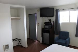 Kuchyň nebo kuchyňský kout v ubytování Sprague Motel