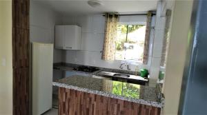 Kuchyň nebo kuchyňský kout v ubytování Pousada Ecomar