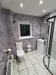 Koupelna v ubytování Lemon Apartment + 32 fotografií