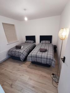 Postel nebo postele na pokoji v ubytování Lemon Apartment