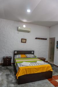 Postel nebo postele na pokoji v ubytování Casa Rivera Del Castillo