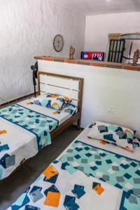 Postel nebo postele na pokoji v ubytování Casa Rivera Del Castillo