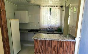 Kuchyň nebo kuchyňský kout v ubytování Pousada Ecomar