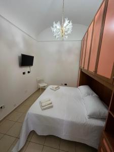 Postel nebo postele na pokoji v ubytování Antica Dimora