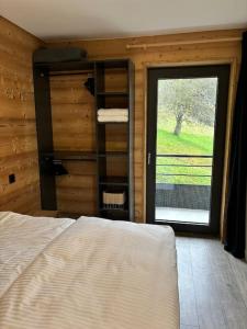 Postel nebo postele na pokoji v ubytování Le Savoisien, Appartement in centrum Chatel 150 m van ski-lift