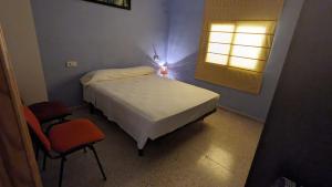 Postel nebo postele na pokoji v ubytování Casa Frasquita + 9 fotografií