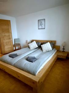 Postel nebo postele na pokoji v ubytování Apartment Snowball, Modern, cosy, Matterhorn views