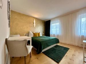 Postel nebo postele na pokoji v ubytování Museumsquartier Apartment