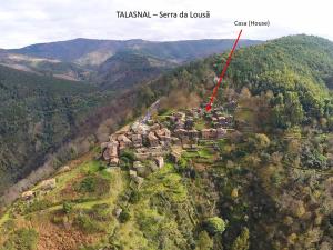 an aerial view of a village on a mountain at Casa Arouzi in Talasnal