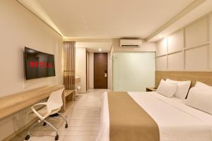 Ένα ή περισσότερα κρεβάτια σε δωμάτιο στο Hotel Dix