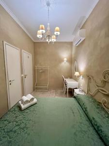 Postel nebo postele na pokoji v ubytování Boutique Hotel Calais Milano