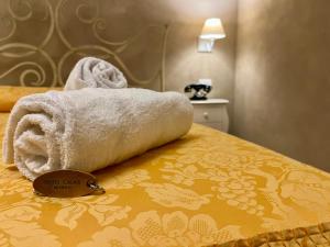 Postel nebo postele na pokoji v ubytování Boutique Hotel Calais Milano