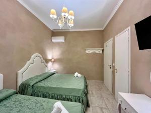 Postel nebo postele na pokoji v ubytování Boutique Hotel Calais Milano