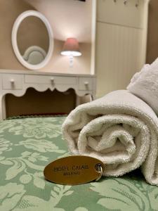 Postel nebo postele na pokoji v ubytování Boutique Hotel Calais Milano