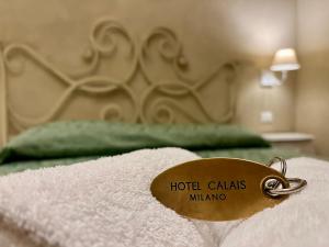Postel nebo postele na pokoji v ubytování Boutique Hotel Calais Milano