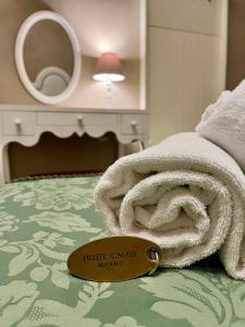 Postel nebo postele na pokoji v ubytování Boutique Hotel Calais Milano
