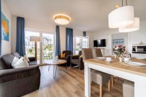 TV a/nebo společenská místnost v ubytování Zweite Heimat 49 0 N