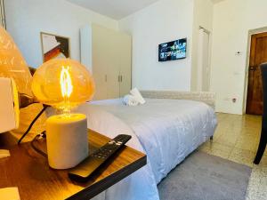 Postel nebo postele na pokoji v ubytování Echoes room 20 minuti dal centro di Firenze