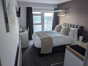 Postelja oz. postelje v sobi nastanitve Fieldhead Hotel, Looe