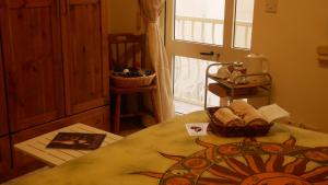 Rúm í herbergi á Marsalforn's Cosy Room