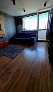 Posedenie v ubytovaní Apartament przy alei Kopernika