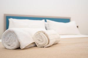 Postel nebo postele na pokoji v ubytování Casa Vossia