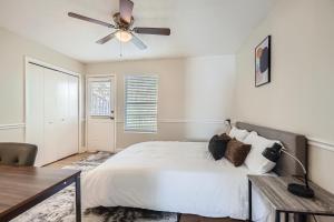 a bedroom with a bed and a ceiling fan at Overlook Club C6 L Spacious And Cozy in Cumming +11 photos