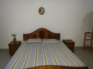 Un pat sau paturi într-o cameră la Chandana Villa