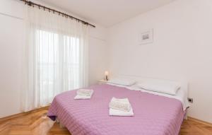 Łóżko lub łóżka w pokoju w obiekcie Apartment Blazenka