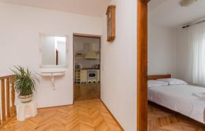 Łóżko lub łóżka w pokoju w obiekcie Apartment Blazenka
