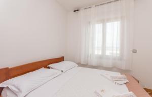 Łóżko lub łóżka w pokoju w obiekcie Apartment Blazenka