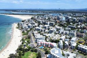 an aerial view of a beach with condos at Coastal Comfort, Relaxing Kings Beach Retreat in Caloundra