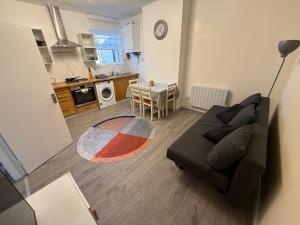 Η κουζίνα ή μικρή κουζίνα στο City Hideaway +7 φωτογραφίες