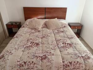 Postel nebo postele na pokoji v ubytování Lindo y acogedor departamento.