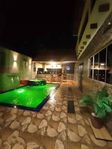 Πισίνα στο ή κοντά στο Lofts Toca das Corujas - Piscina e jacuzzi com aquecimento solar