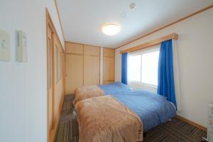 Foto sihtkohas Kutchan asuva majutusasutuse 倶知安Tsuru House 車ガレージ完備 スーパーマーケット徒歩2分 galeriist