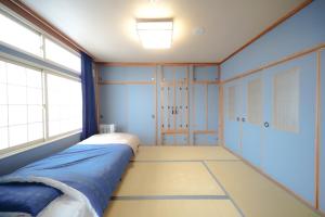 Foto sihtkohas Kutchan asuva majutusasutuse 倶知安Tsuru House 車ガレージ完備 スーパーマーケット徒歩2分 galeriist