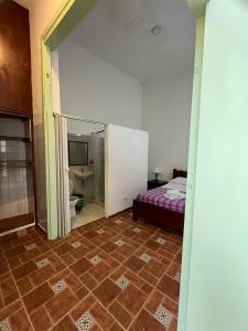 Koupelna v ubytování Sandalio Hostal Cali