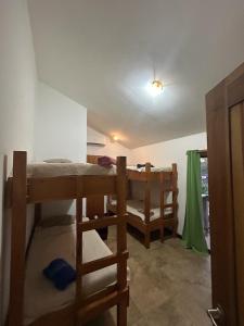 a room with two bunk beds in a room at Beach house between Tamarindo and Avellanas in Santa Cruz +11 photos