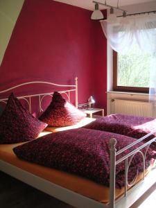 A bed or beds in a room at Natur-Aktiv-Hof Thiem