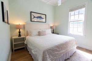 Voodi või voodid majutusasutuse Lighthouse Suites Collection toas