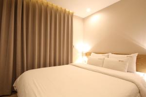 Hotel Prima Busan客房内的一张或多张床位