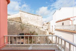 a balcony with a view of a building at Casa Sant'Anna in Ragusa
