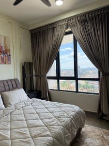 Postel nebo postele na pokoji v ubytování Troika Kota Bharu by Tasra Homestay with Free CarPark ACCEPT MALAYSIAN ONLY
