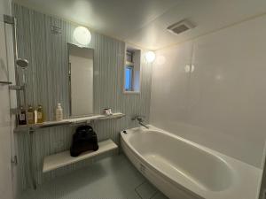 Koupelna v ubytování Hotel RIO新宿